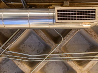 Air conditioning cooling tube on the roof of a building.